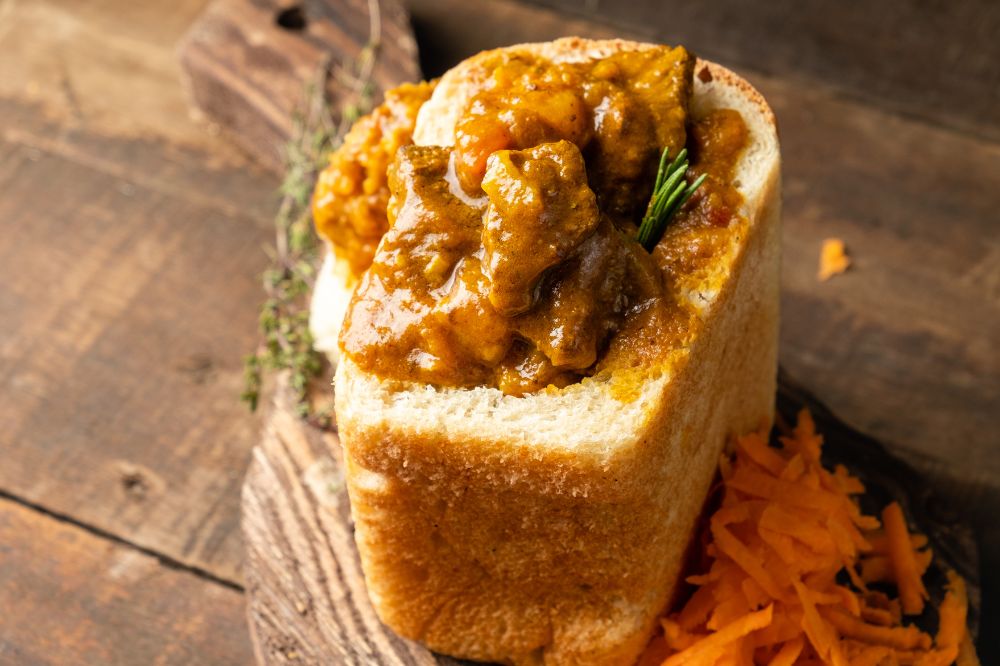 Bunny Chow - Curry housed in a hollowed-out loaf of bread.