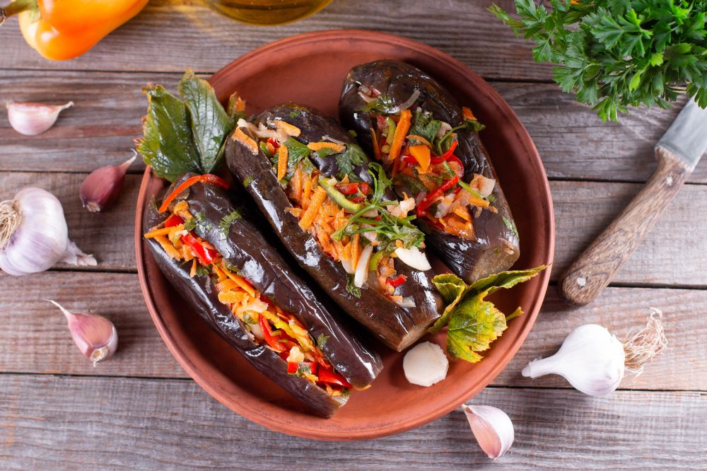 Imam Bayıldı - Eggplant stuffed with onions, garlic, and tomatoes.