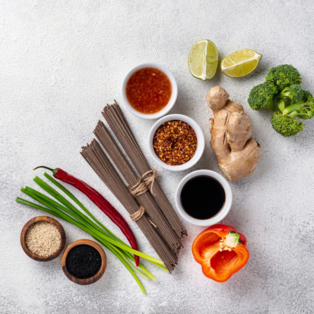 Asian seasoning sprinkled over a bowl of rice and vegetables.